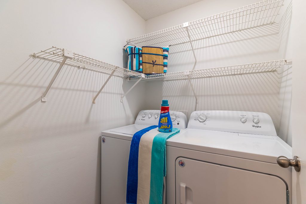 The Elm (2 Bedroom): Full-size washer and dryer in most homes
